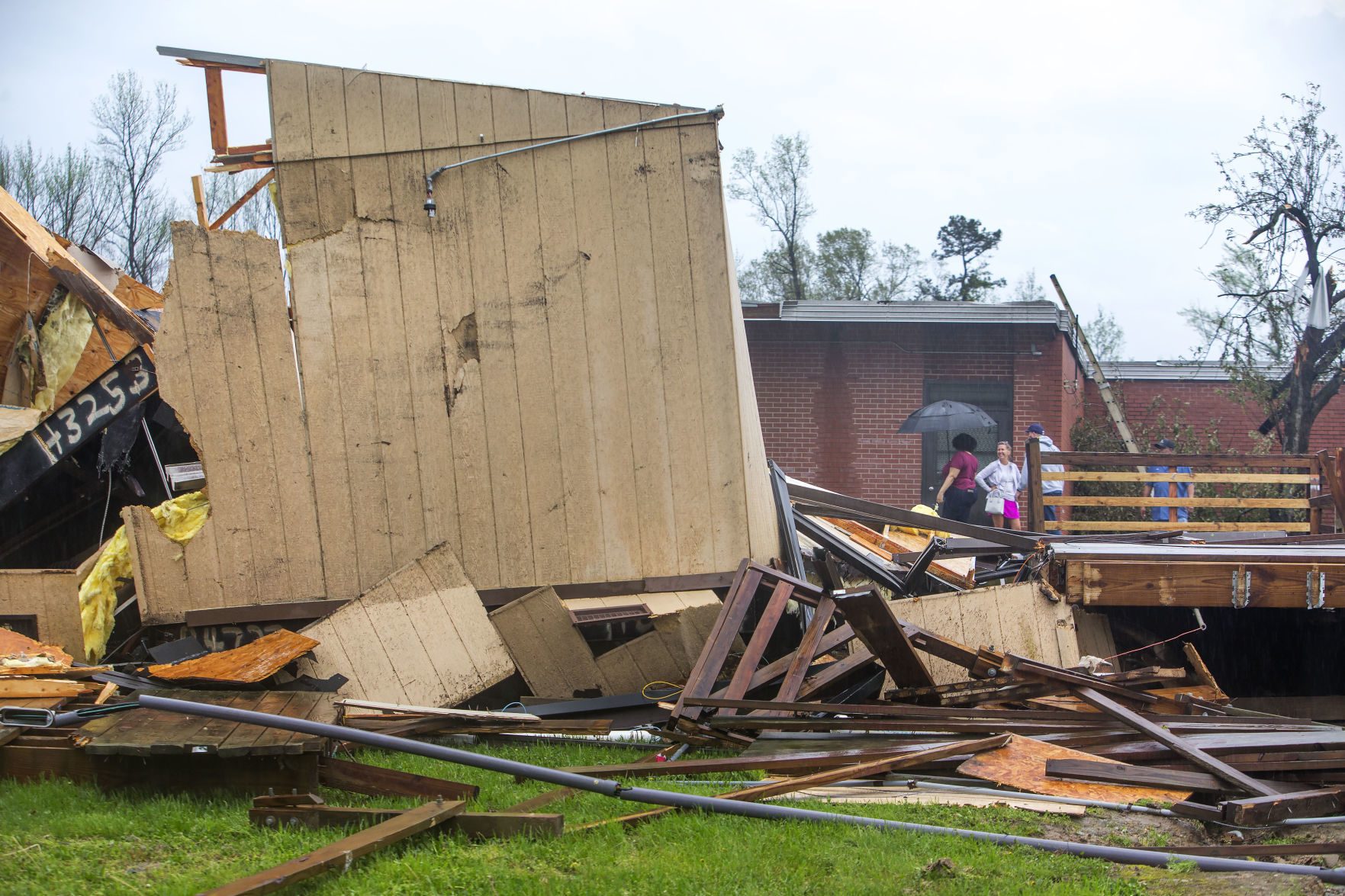 Tornado: Hampton Elementary staff surveys the damage